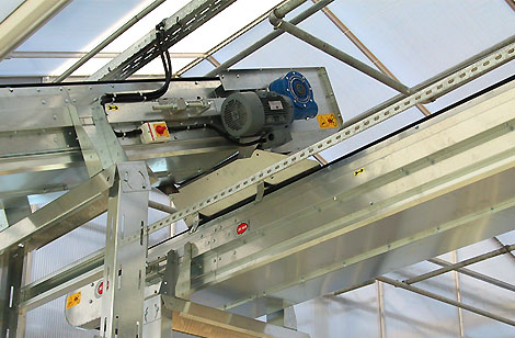 Belt conveyors with bottom cover